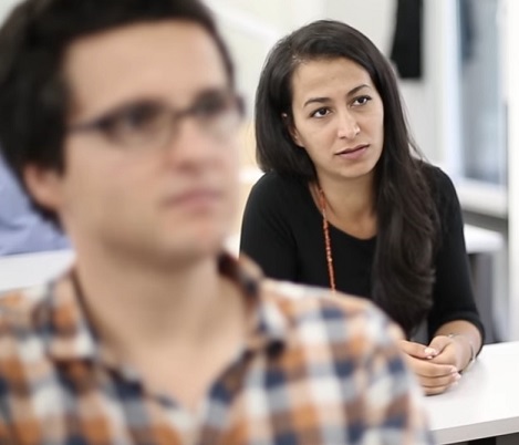 Image: Two students as a still from the information video